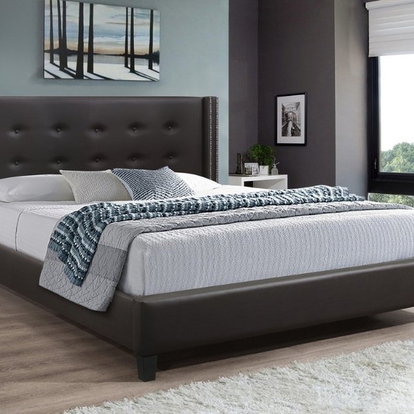 Image depicts a new bed with a mattress from Dani's Furniture.